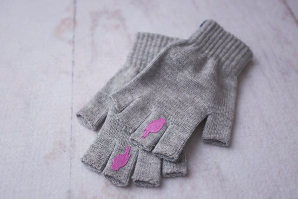 Two stacked Grey Fingerless Gloves with a Pink colored bird on the middle finger