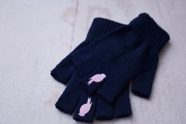 Stacked Navy Fingerless Gloves with a Pink colored bird on the middle finger